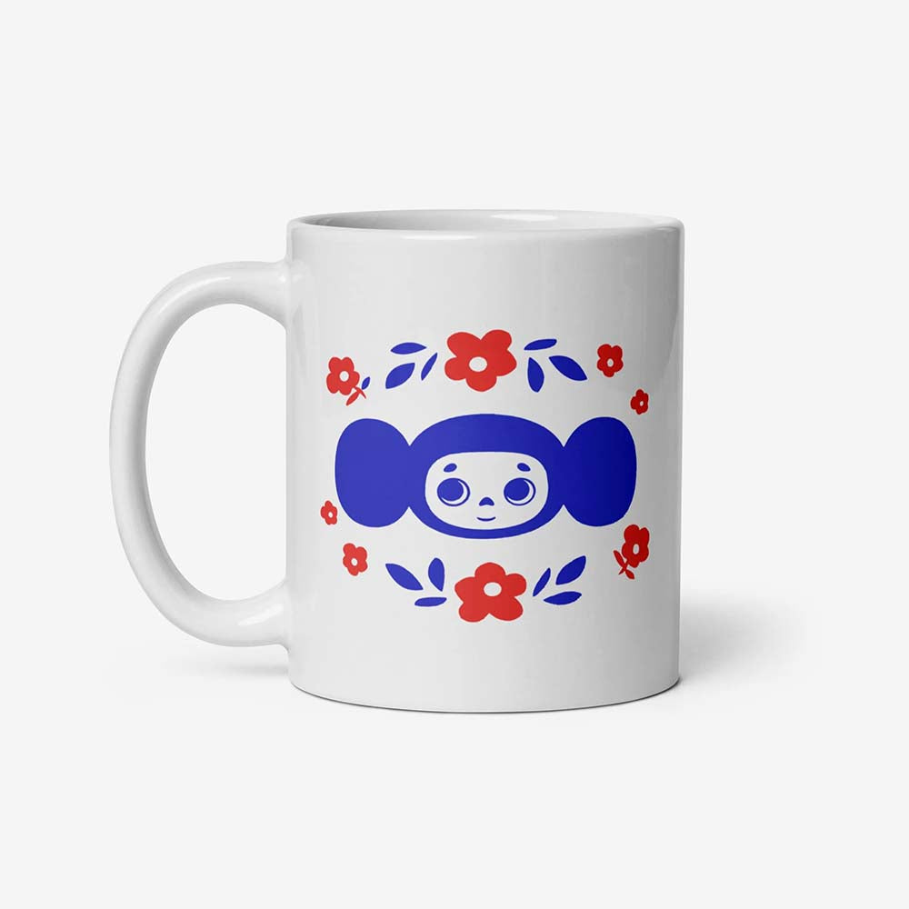 Cheburashka ceramic mug featuring the classic Soviet cartoon character Cheburashka with flowers, inspired by vintage USSR animation.