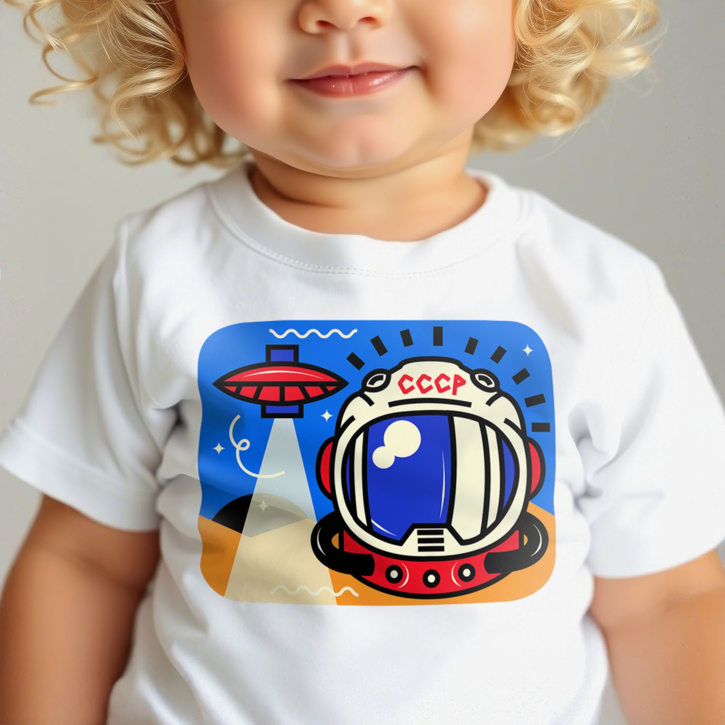 Unisex baby T-shirt with cute cosmonaut in scaphander and UFO illustration on white cotton