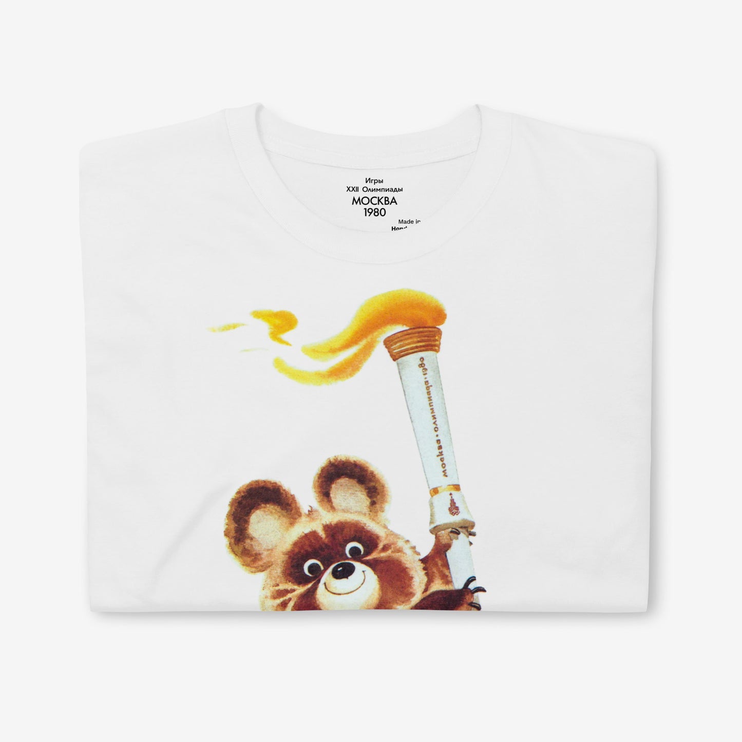 Misha the Olympic Bear T-shirt featuring the iconic 1980 Moscow Olympics design with the Olympic torch, celebrating Soviet sports history.
