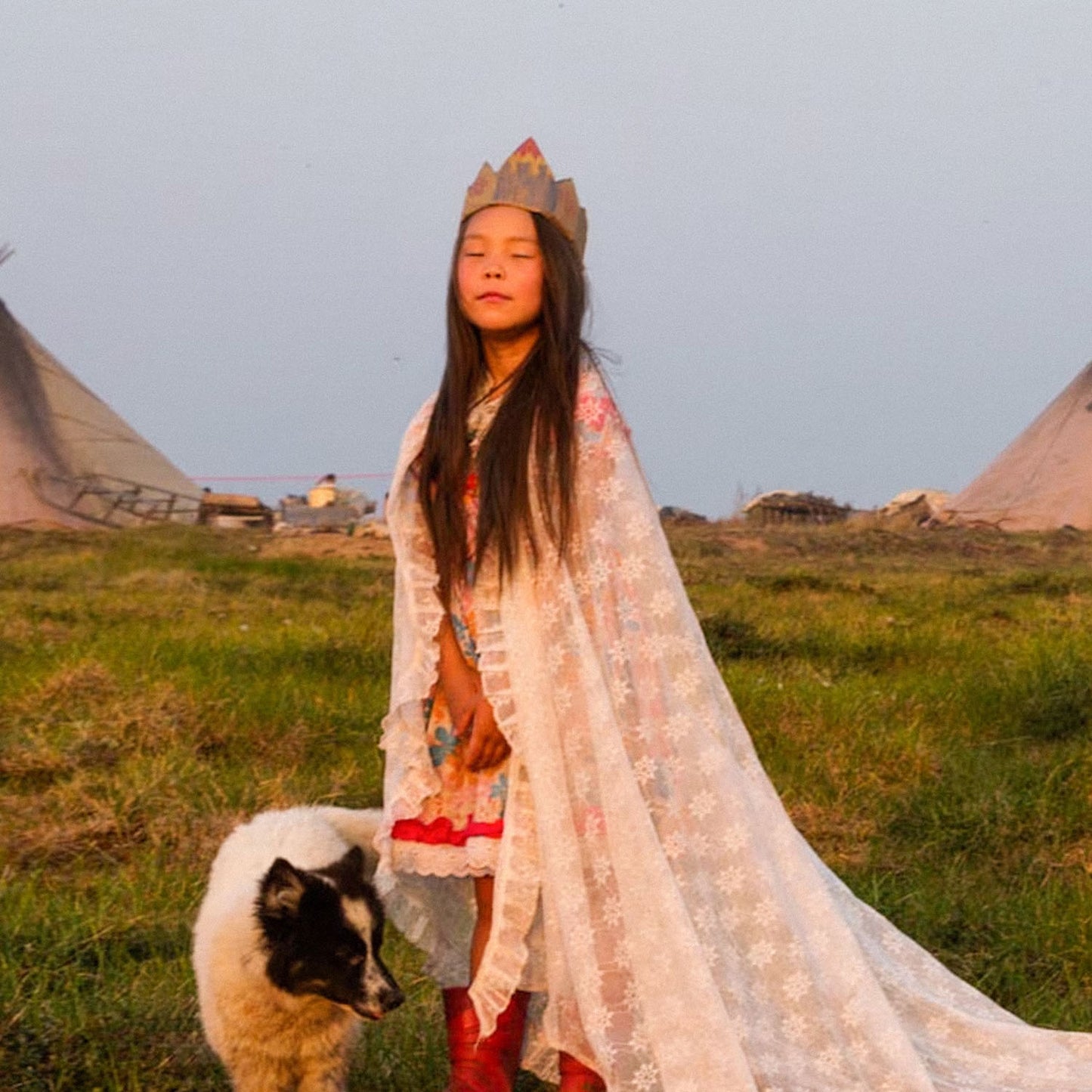 Rare photo of young Nenets bride with dog at sunset, traditional chum tents in background Siberian indigenous people poster. Closeup photo. From www.sovisual.art