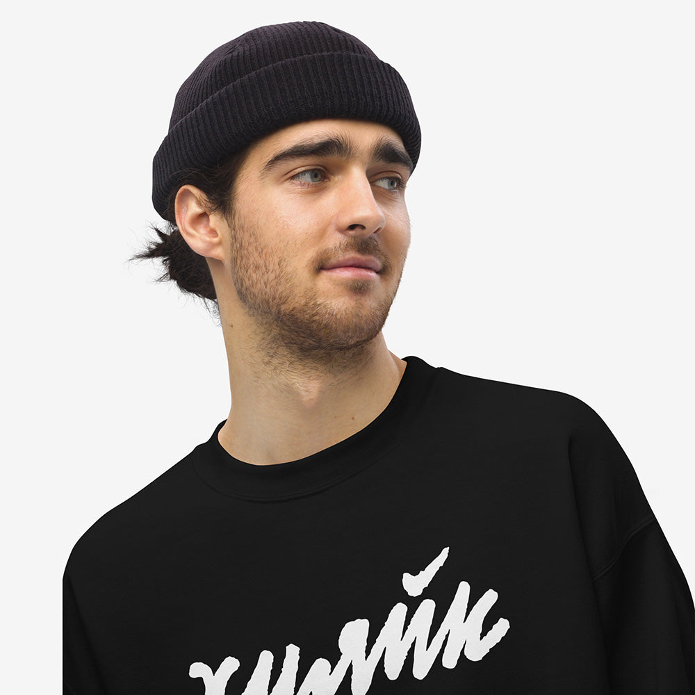 Funny Russian ХУЯЙК parody logo design in bold Cyrillic lettering on premium unisex sweatshirt – a play on Nike with Russian slang twist, perfect for expats and streetwear lovers
