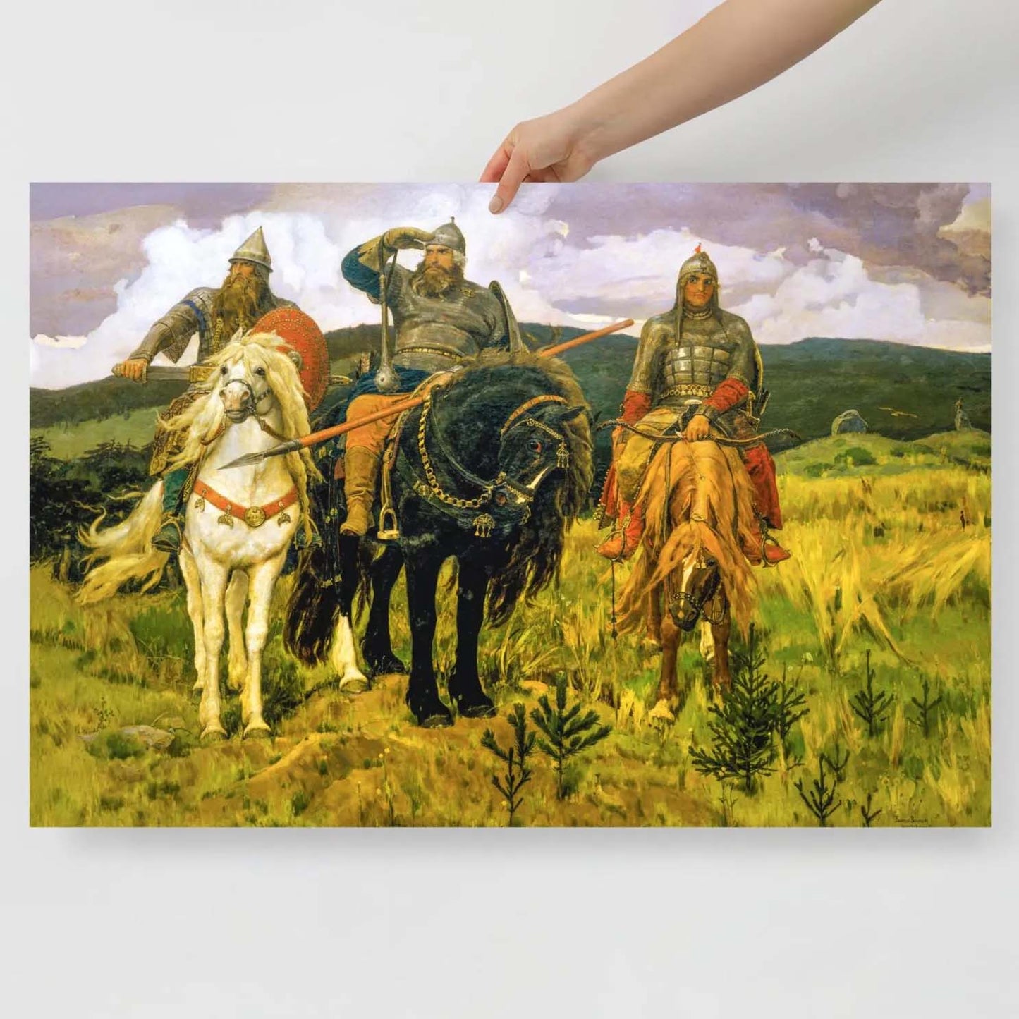 High-quality poster print of Viktor Vasnetsov's Three Bogatyrs, depicting three legendary Russian warriors in stunning detail.