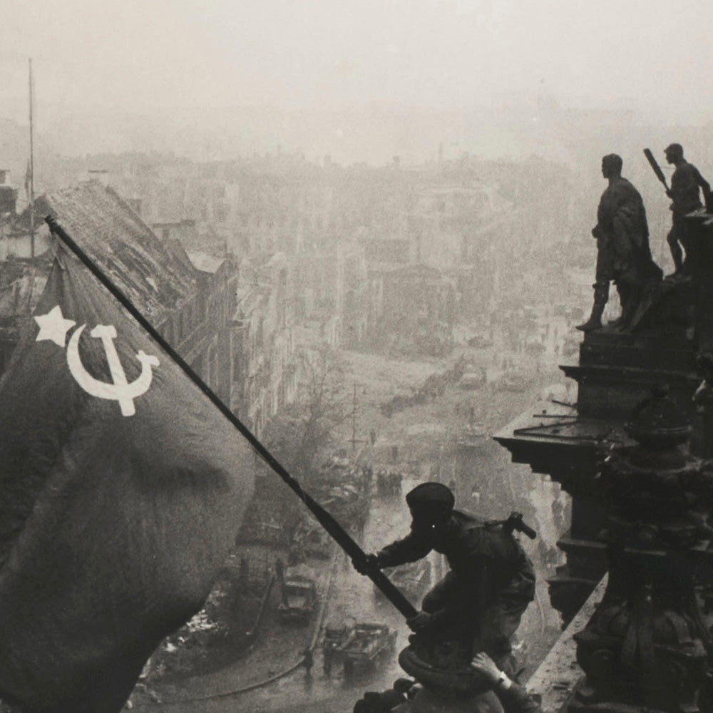 Closup details of Evgeniy Khaldei photo of Soviet soldiers raising red flag over Reichstag, 1945 – Victory in Berlin historical poster print.