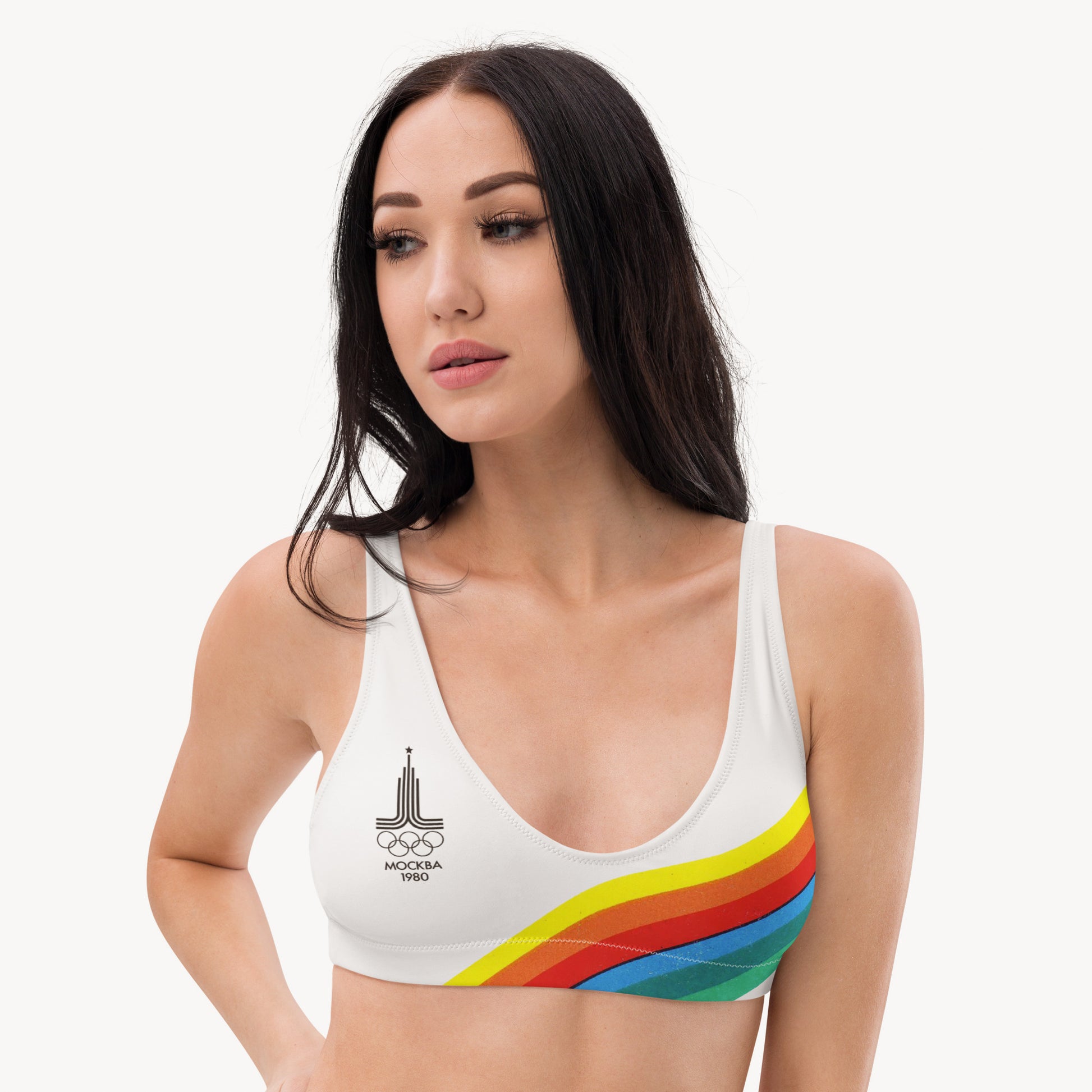 Young fit girl wearing white retro Soviet Olympics bikini top with Moscow 1980 Olympic Games logo. From www.sovisual.art