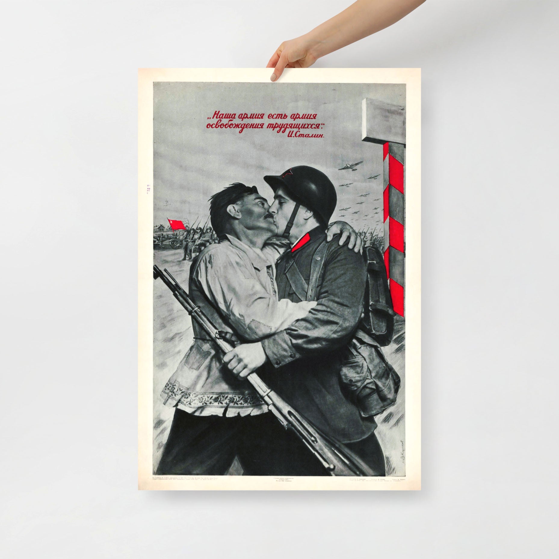 Front view of the Soviet poster, shot in a minimalist setting with natural lighting