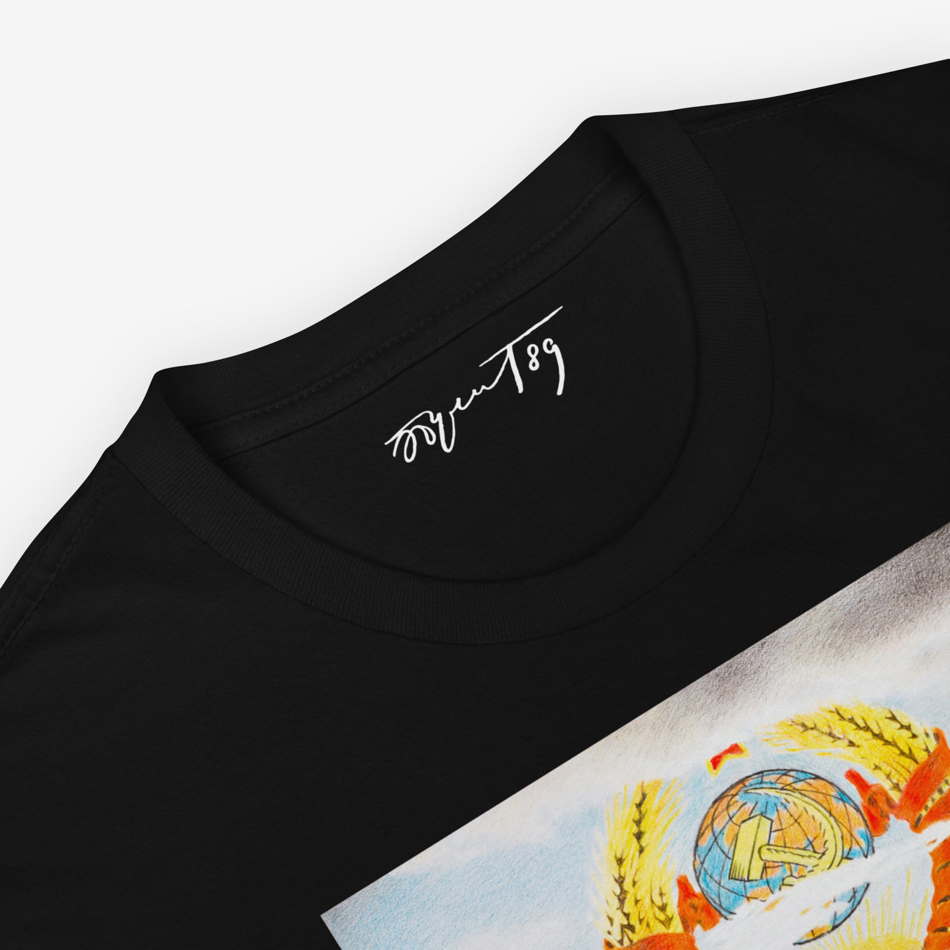 Folded white T-shirt with visible USSR emblem artwork and signature neck label