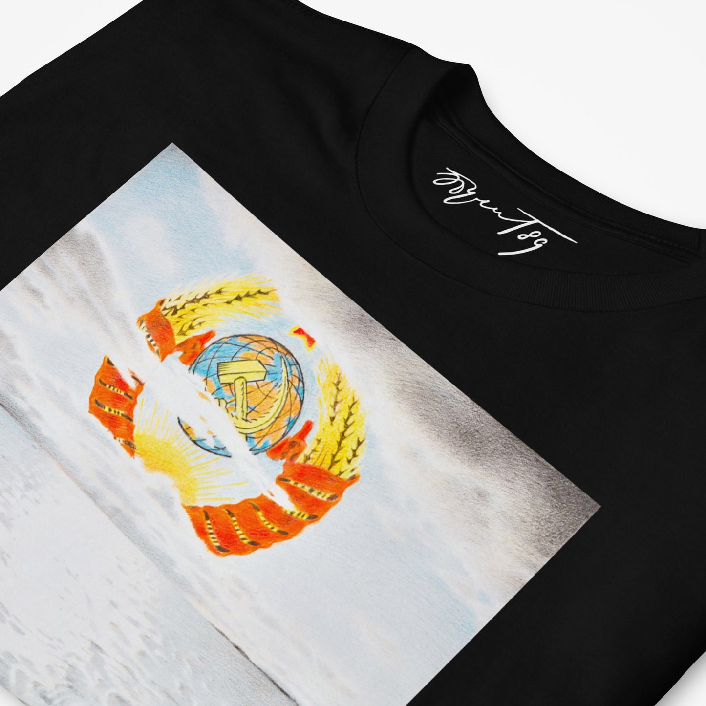 Close-up of Eric Bulatov's artwork on a black T-shirt, highlighting the emblem and clouds