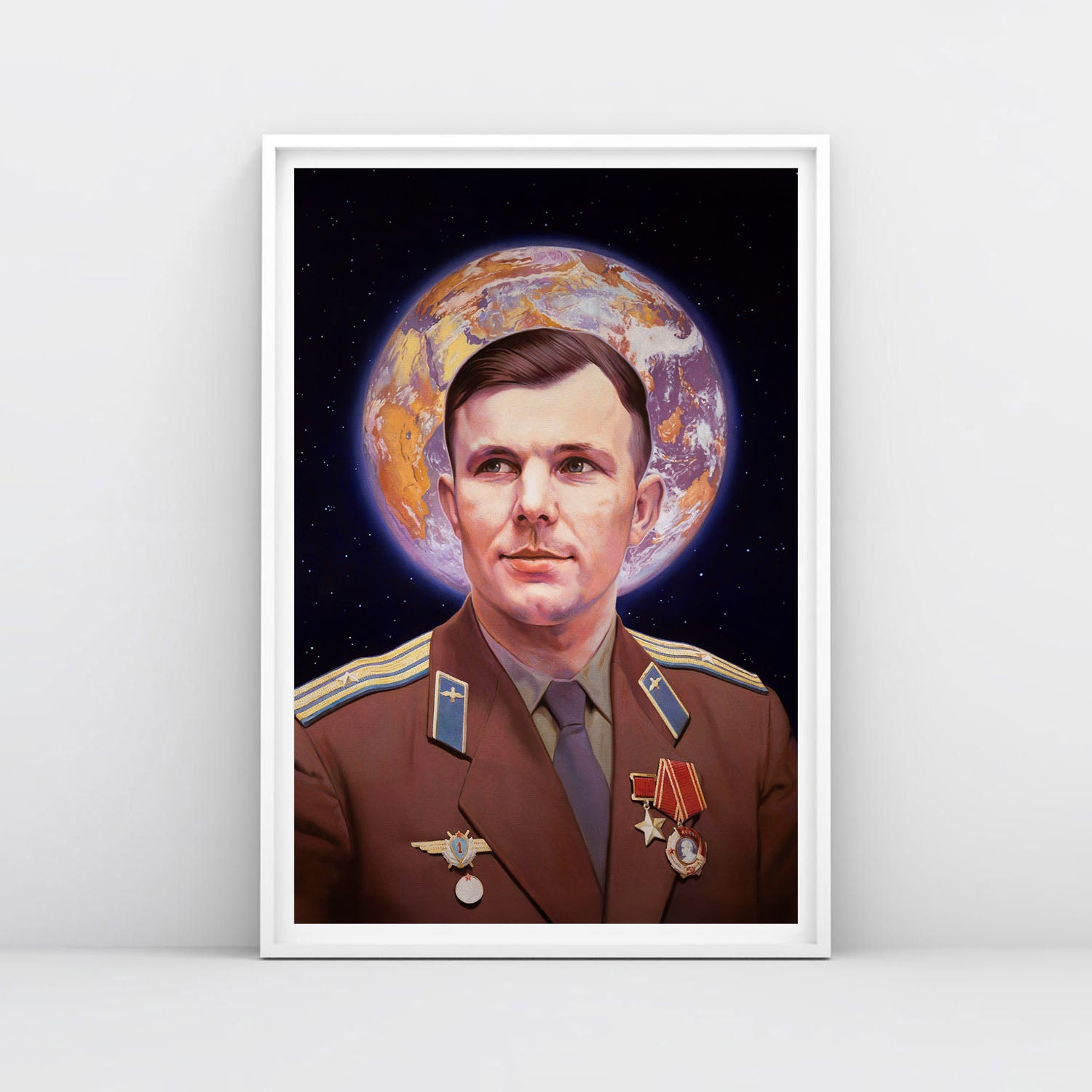 Poster of Yuri Gagarin in uniform with medals, Earth forming a halo behind his head, icon-like Soviet space art in cosmic background