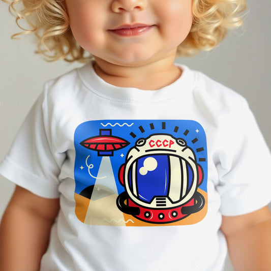 Unisex baby T-shirt with cute cosmonaut in scaphander and UFO illustration on white cotton