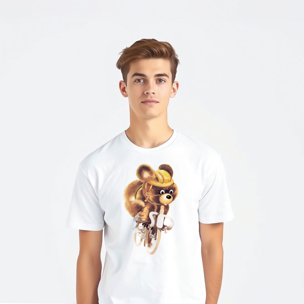 Cool boy wearing white unisex T-shirt with Misha the Bear cycling, rare Moscow 1980 Olympic mascot illustration.