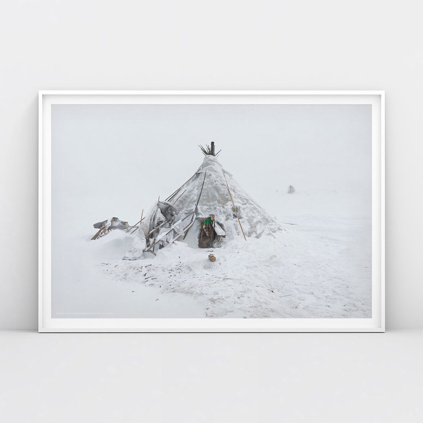 Photo of Nenets woman in traditional clothing near chum tent house in Arctic snow. Siberian indigenous poster rom www.sovisual.art