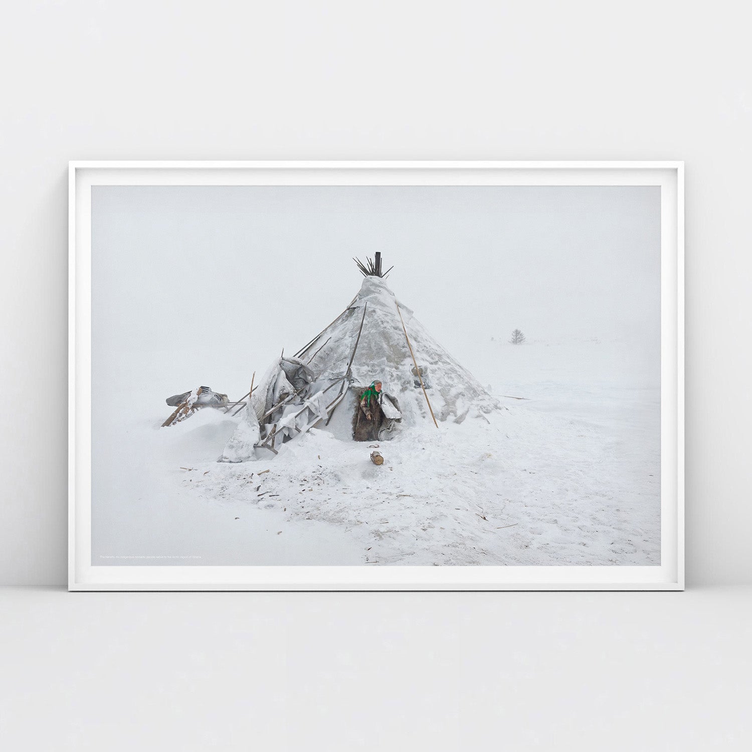 Photo of Nenets woman in traditional clothing near chum tent house in Arctic snow. Siberian indigenous poster rom www.sovisual.art