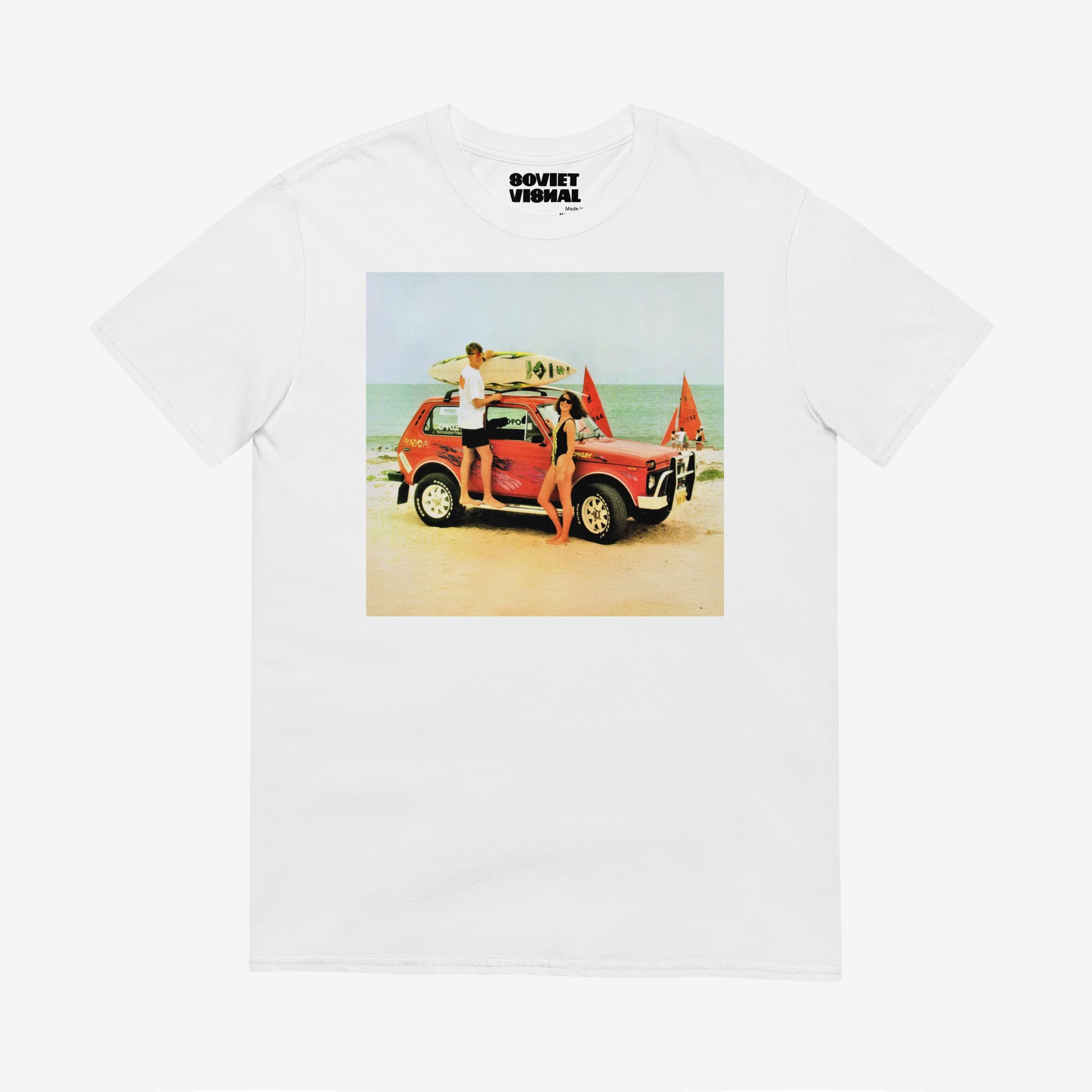 Premium-quality T-shirt featuring a Soviet Niva 4x4 on a beach with the sea in the background