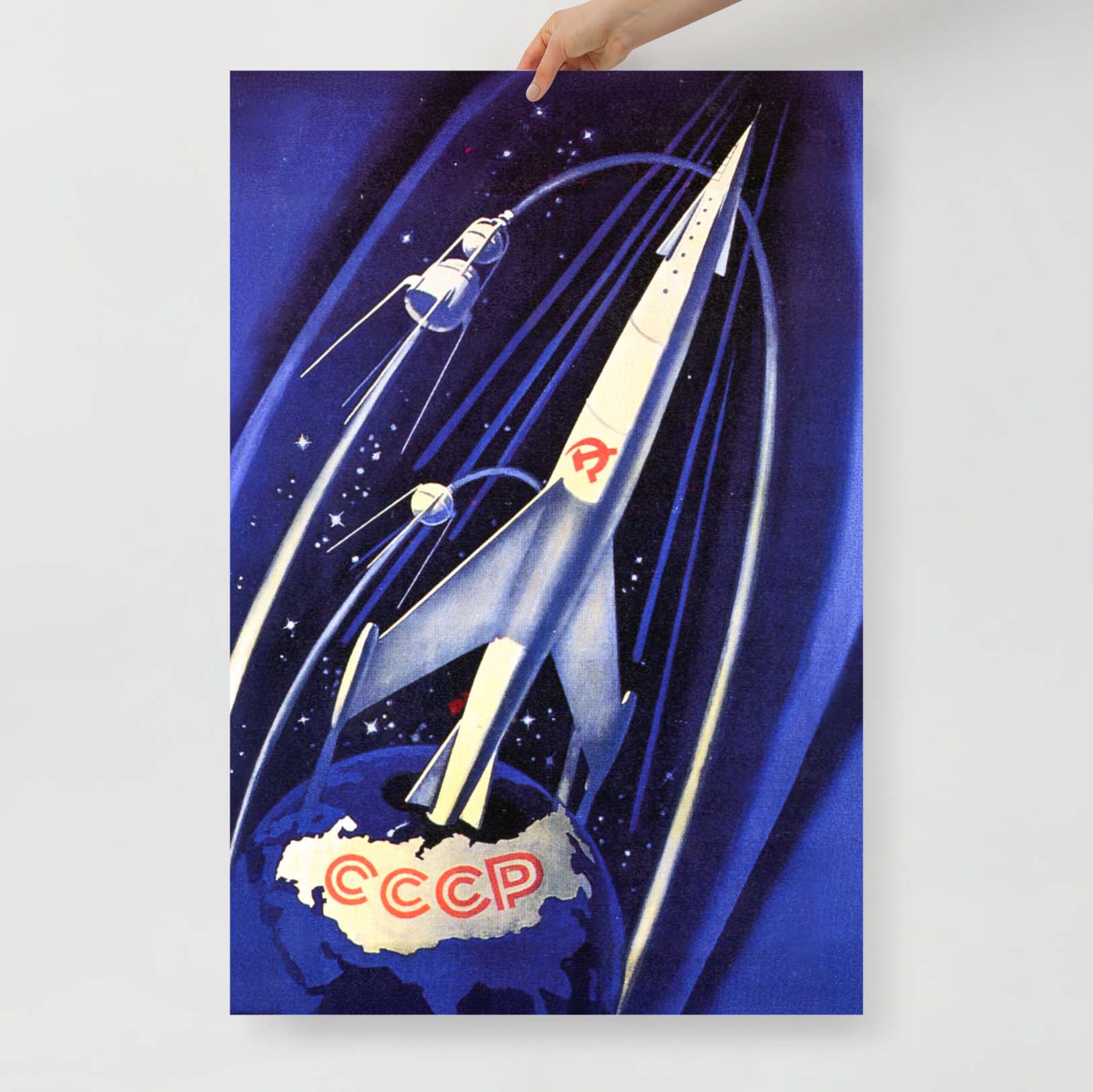 Vintage Soviet space poster featuring a rocket launching into space, with Earth below showing the USSR map and CCCP text. Retro space race artwork.