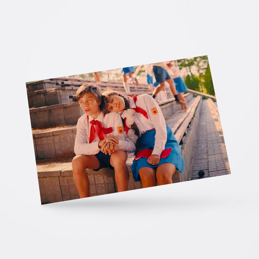 Vintage Soviet postcard featuring young Pioneer boy and girl sitting together in love – a perfect Valentine's Day gift