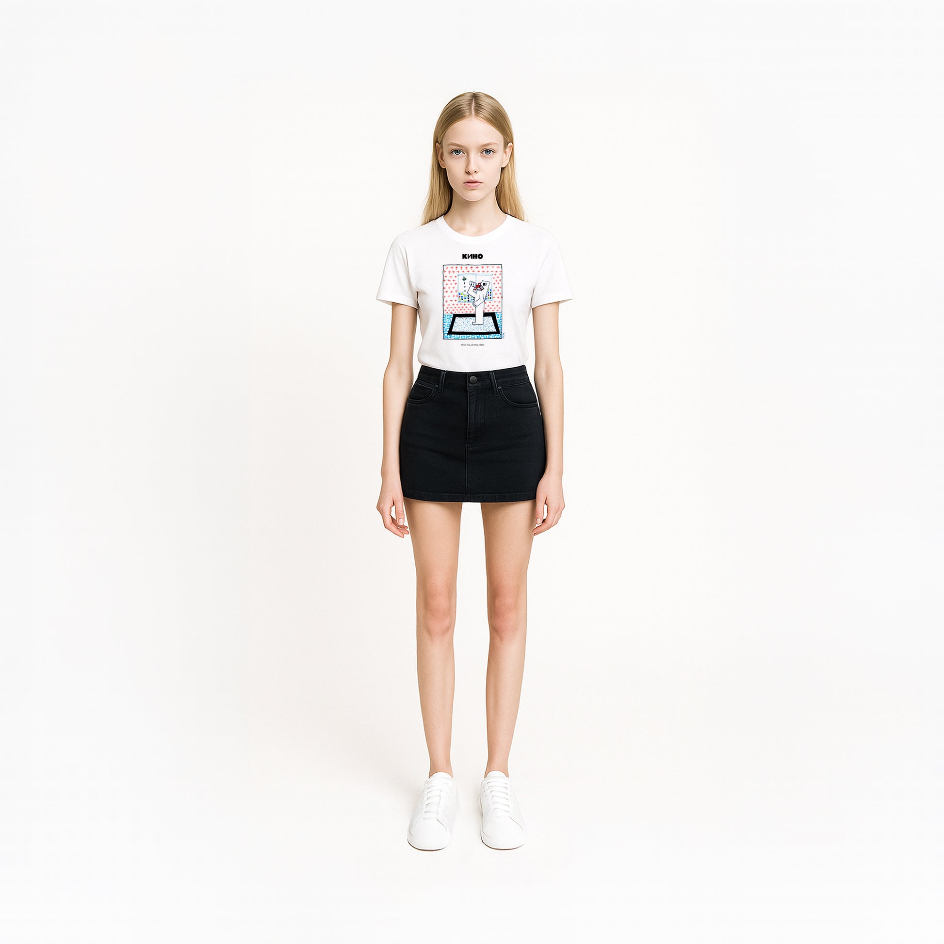 Model girl wearing rare 1980s Viktor Tsoi painting featuring a figure eating another, printed on the front of a heavyweight unisex t-shirt with a KINO logo and custom inside neck label design
