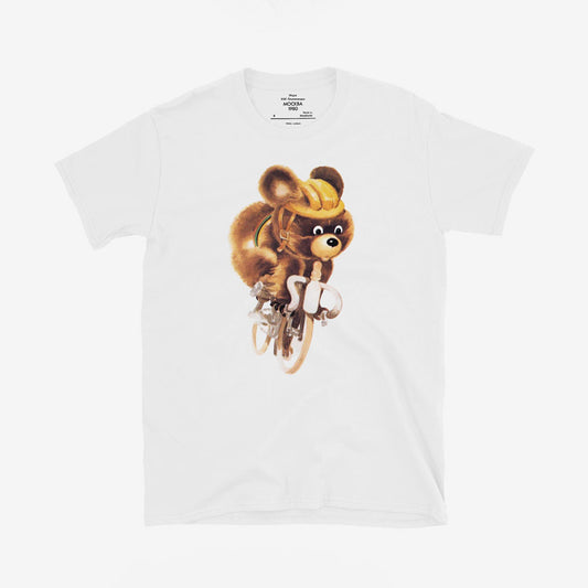 White unisex T-shirt with Misha the Bear cycling, rare Moscow 1980 Olympic mascot illustration.
